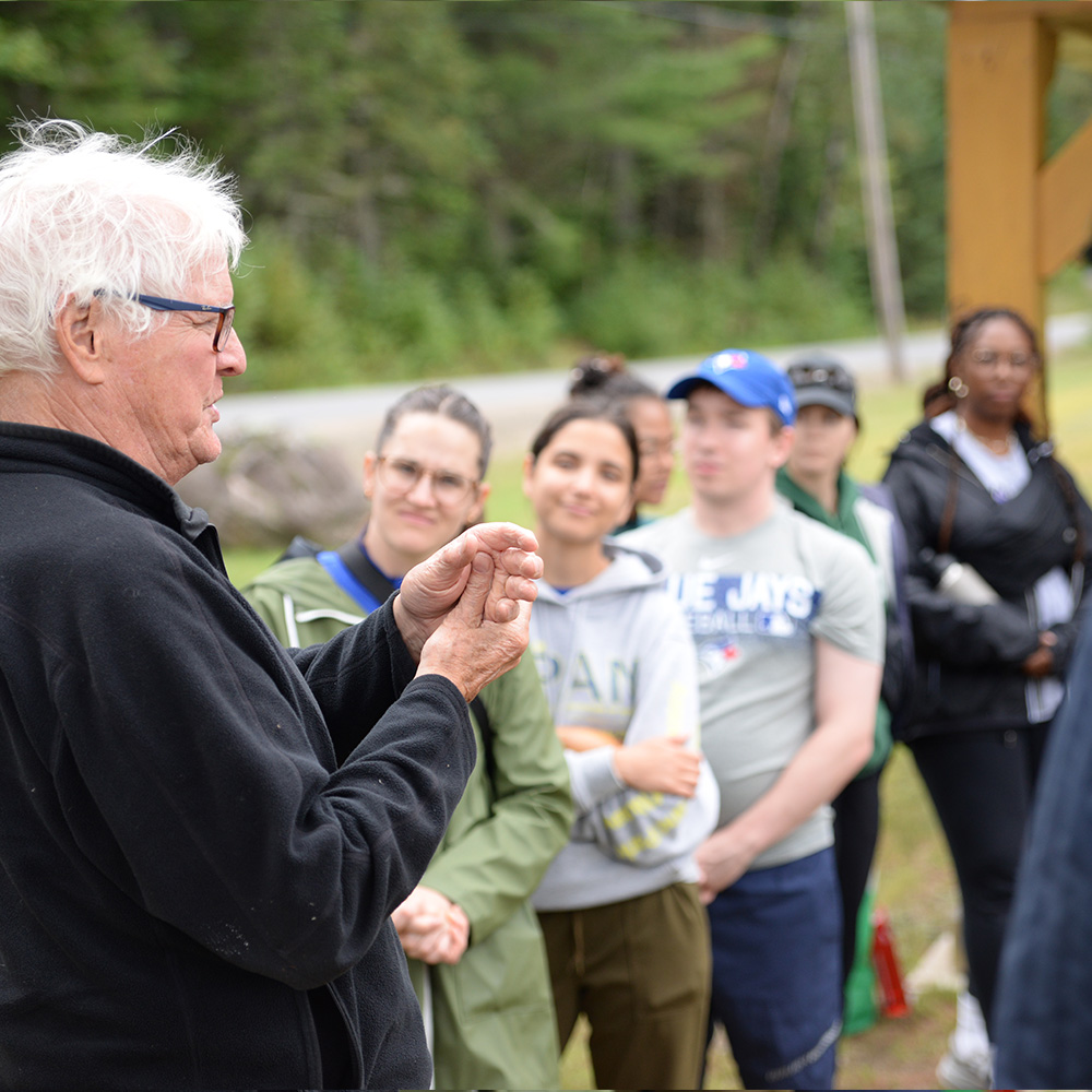 Township volunteer Doug Ward talking to the Jays Care Foundation group about the Oxtounge Rapids Trail