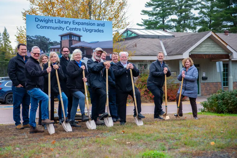 From right to left: Lake of Bays Library Board Chair Cathy Vanclieaf, Mayor Terry Glover, members of Council, municipal staff, and representatives from Davicor Construction Inc. break ground at the Dwight Library and Community Centre on October 21, 2025.