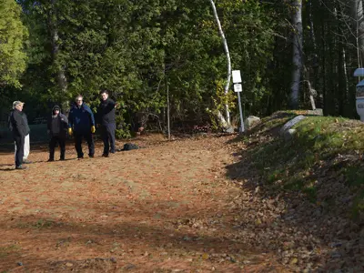Councillors and staff getting a walkthrough of the park viewing the new berm 