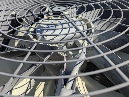Two overheated fan motors which ignited the plastic housing