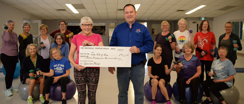 The Baysville Exercise Group presenting a cheque to the Superintendent of Parks and Facilities for the Township of Lake of Bays